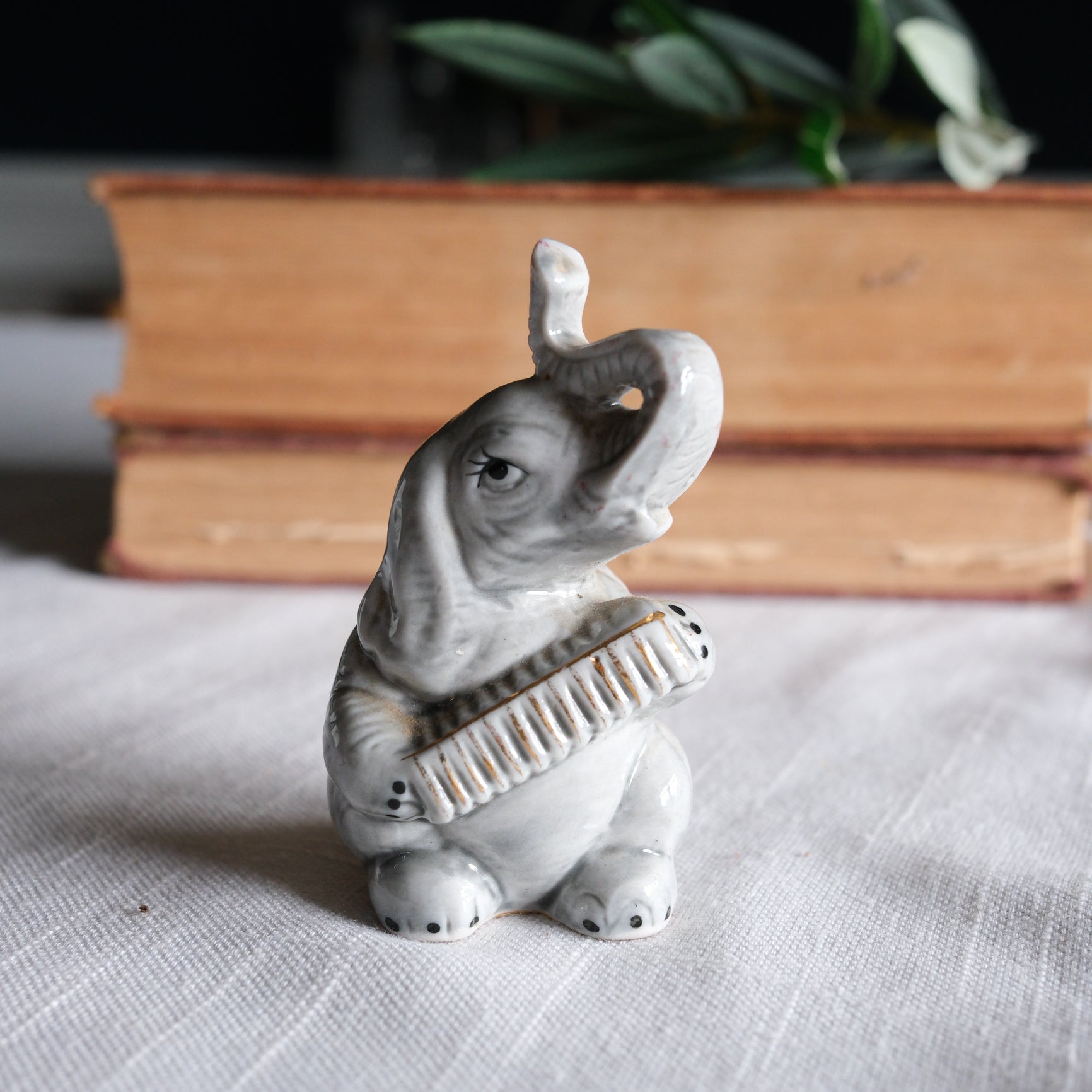 Vintage Ceramic 3" Gray Elephant Playing Accordion with Gold Details