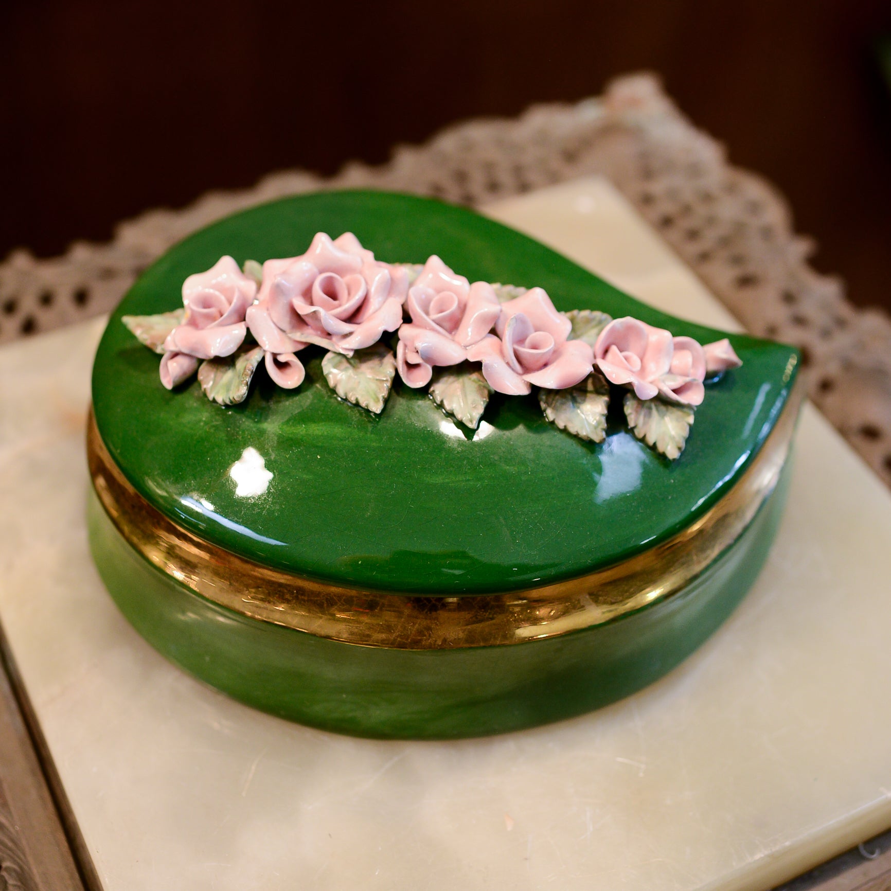 Porcelain Green and Gold Trimmed Jewelry Box with Raised Row of Pink Flowers