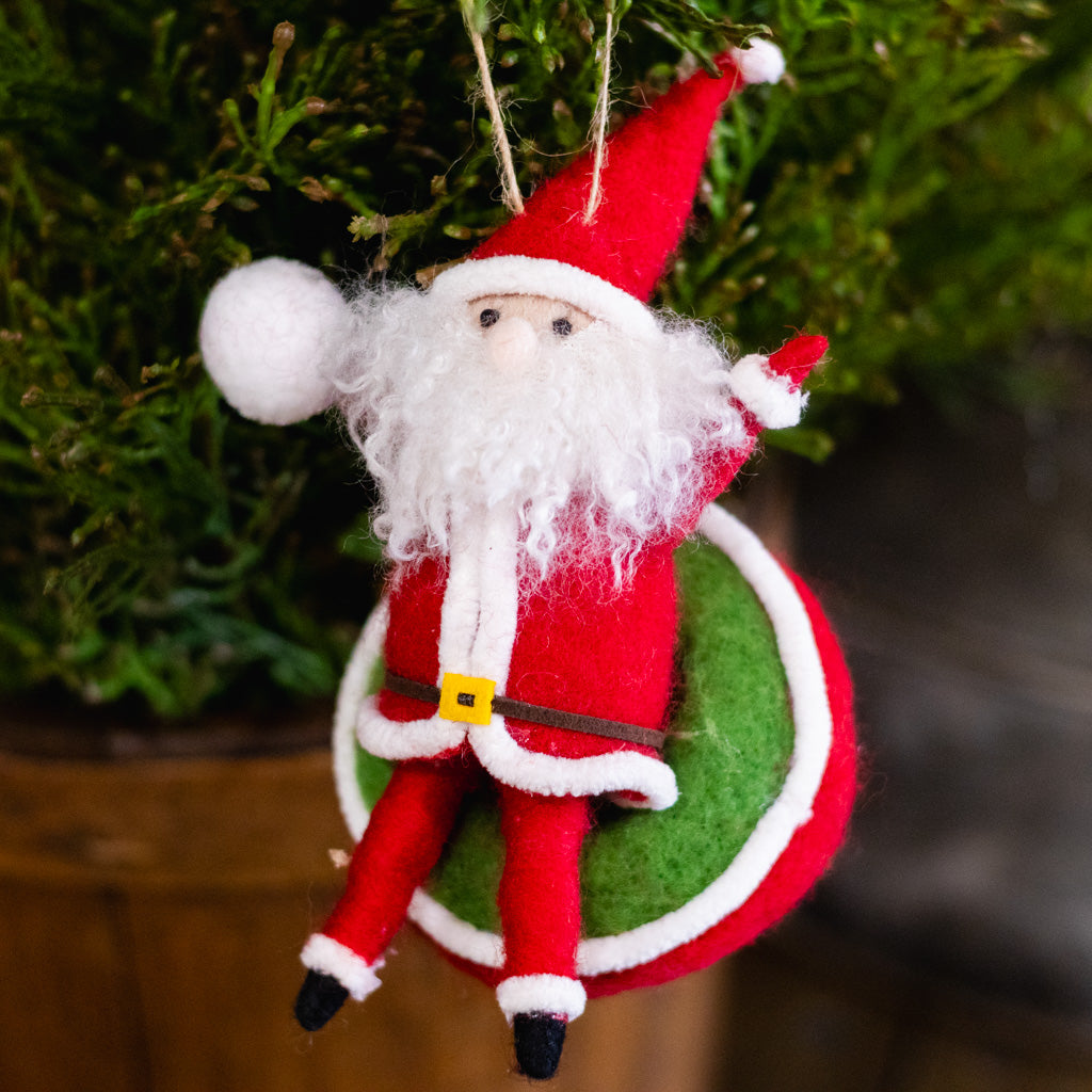 Felt Santa with Snowball on Inner Tube Sled Onament