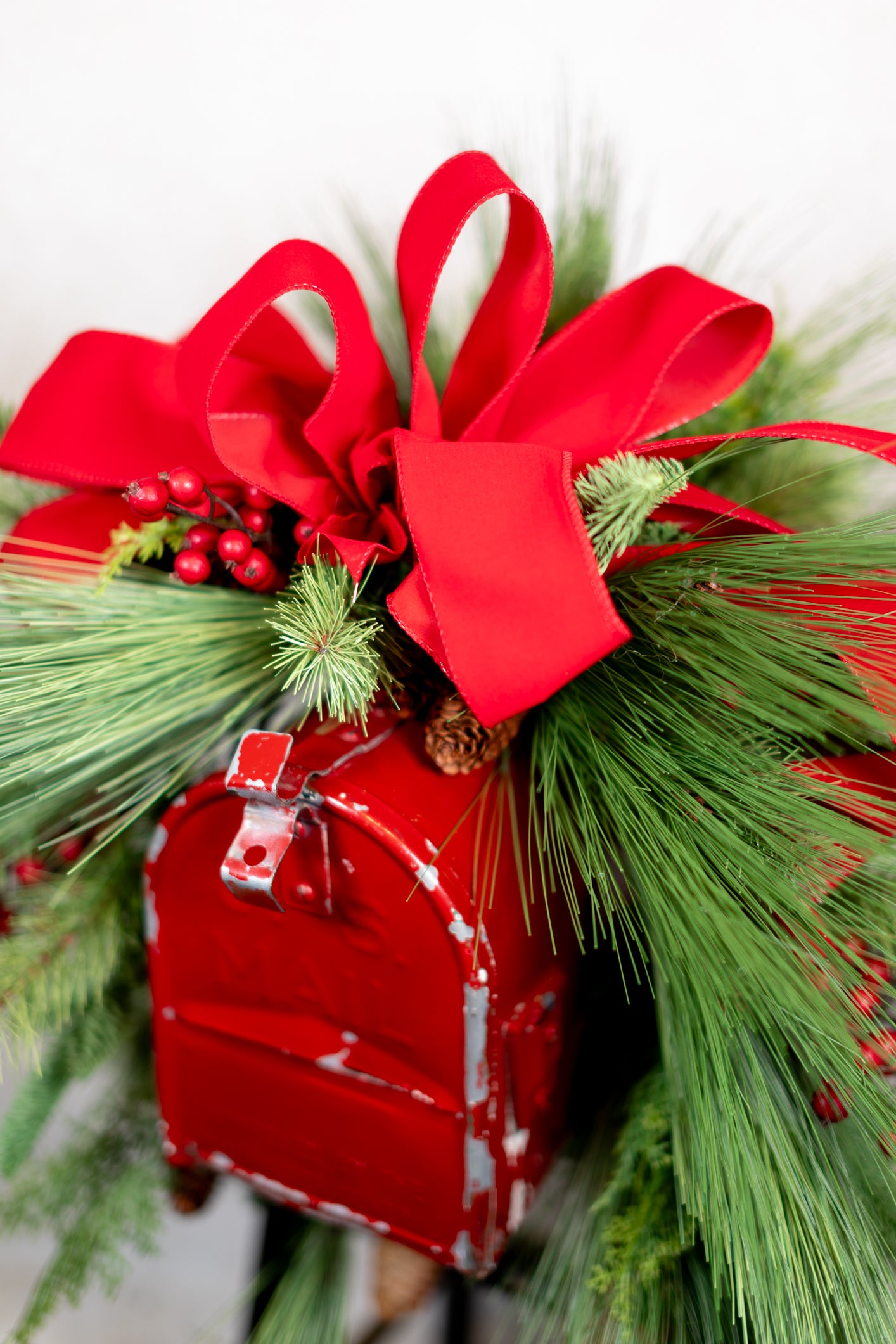 Decorated Outdoor Swag with Berries, Pine and Velvet Ribbon