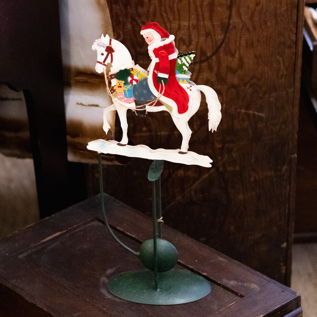 Santa Rocking on A Rocking Horse