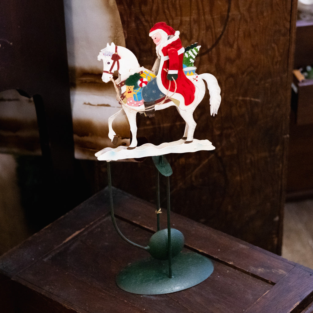 Santa Rocking on A Rocking Horse