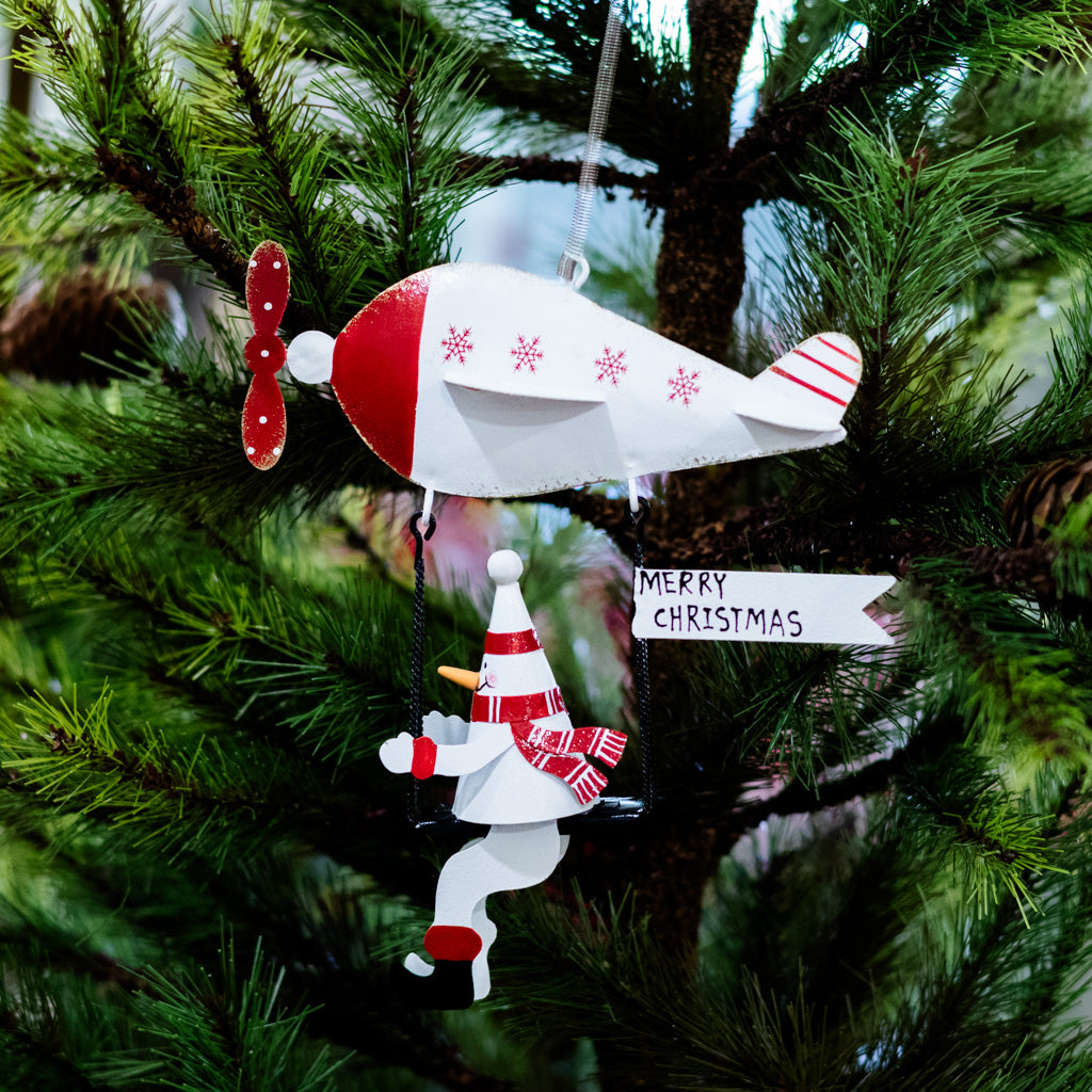 Metal Snowman on Flying Machine with Spring Hangers
