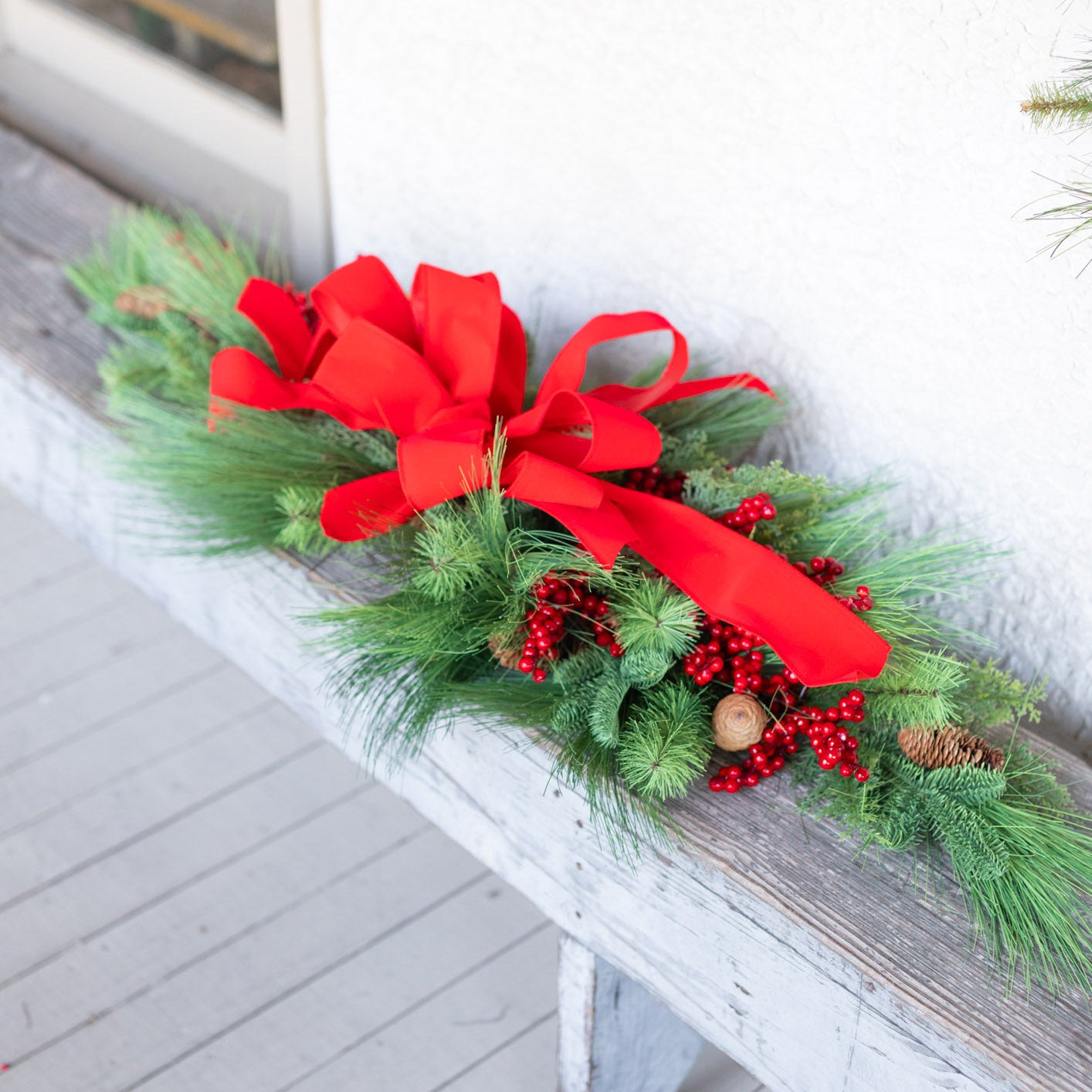 Decorated Outdoor Swag with Berries, Pine and Velvet Ribbon