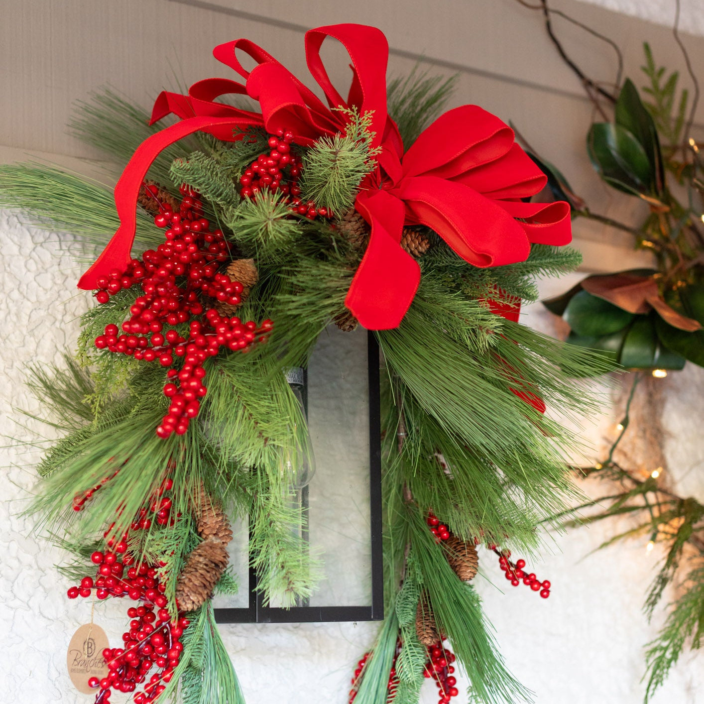 Decorated Outdoor Swag with Berries, Pine and Velvet Ribbon