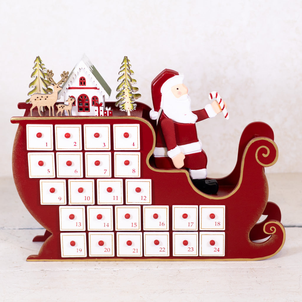 Santa in Sleigh with LED House Scene Wood Advent Calendar