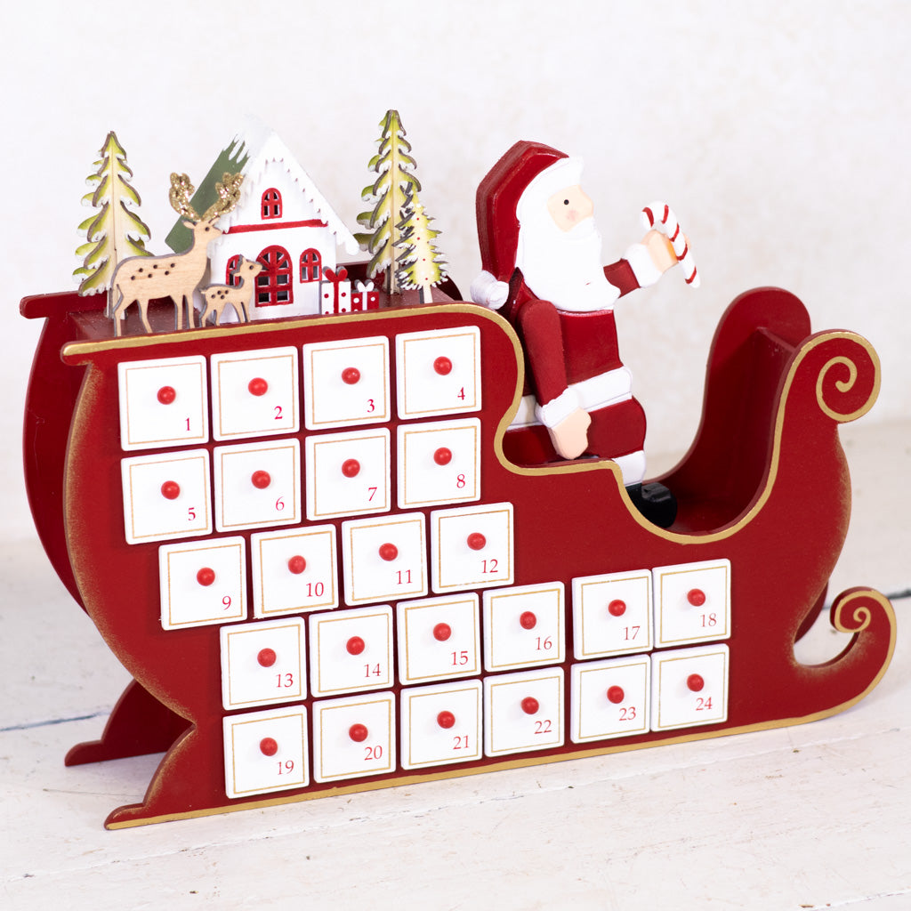 Santa in Sleigh with LED House Scene Wood Advent Calendar