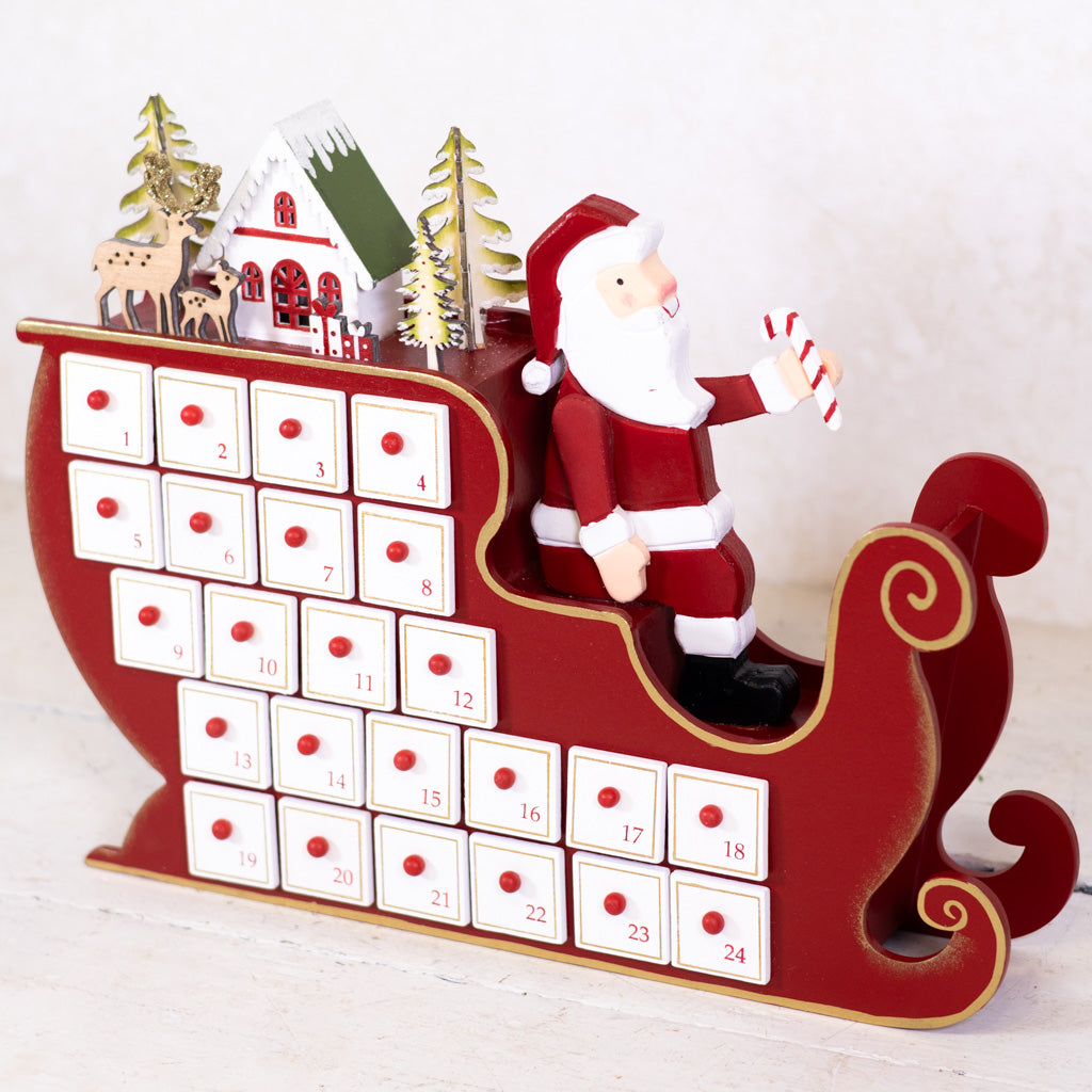 Santa in Sleigh with LED House Scene Wood Advent Calendar