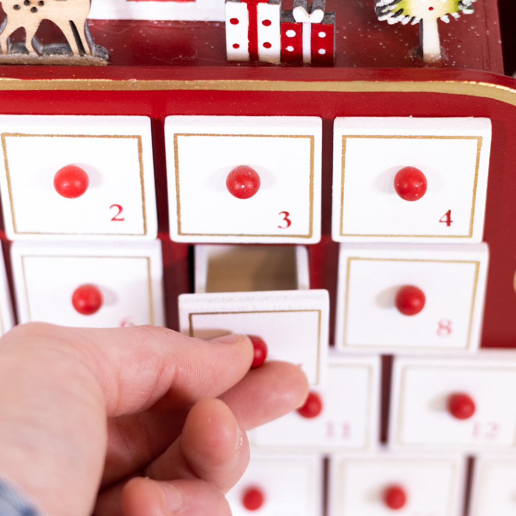 Santa in Sleigh with LED House Scene Wood Advent Calendar