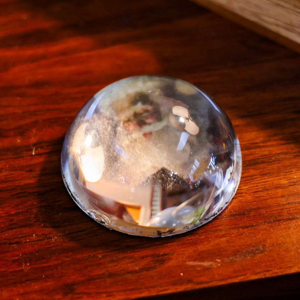 Santa Reading Book Glass Paperweight