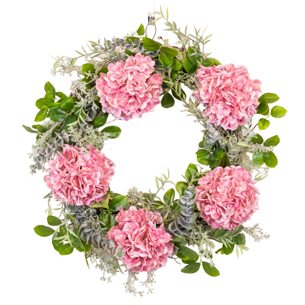 A round wreath featuring pink hydrangea flowers with green leaves and decorative foliage.