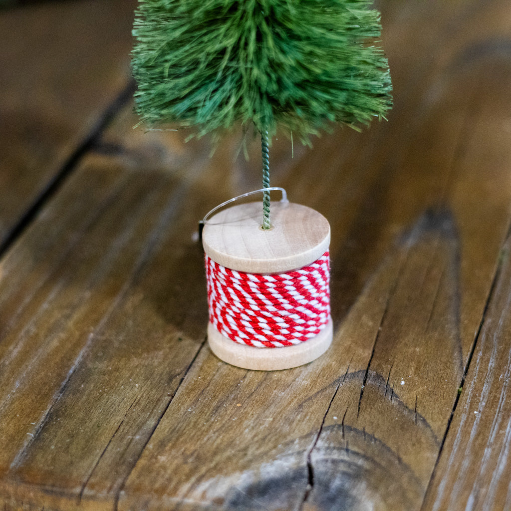 Light Green Sisal Bottle Brush Tree on Red and White Spool