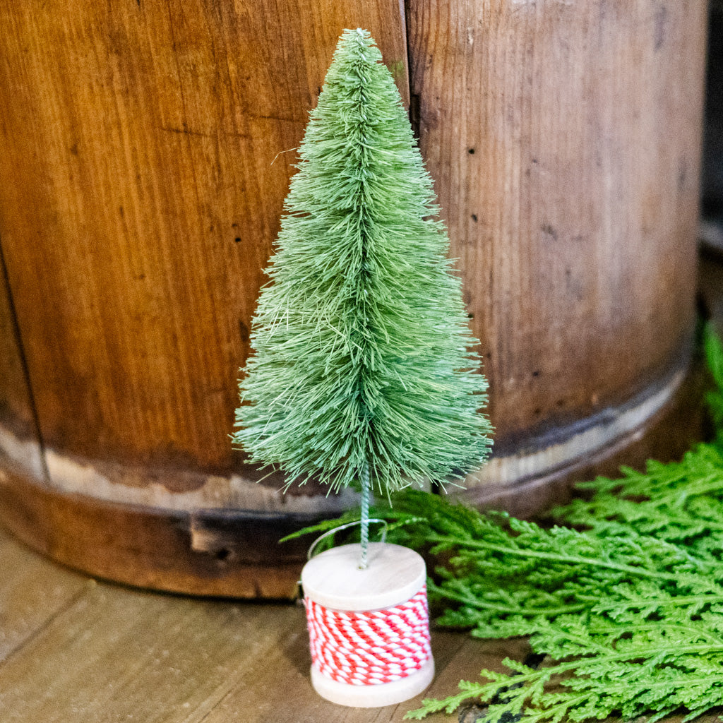 Light Green Sisal Bottle Brush Tree on Red and White Spool