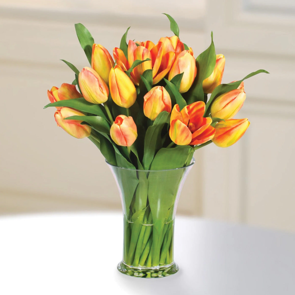 Yellow and Orange Tulips in Glass