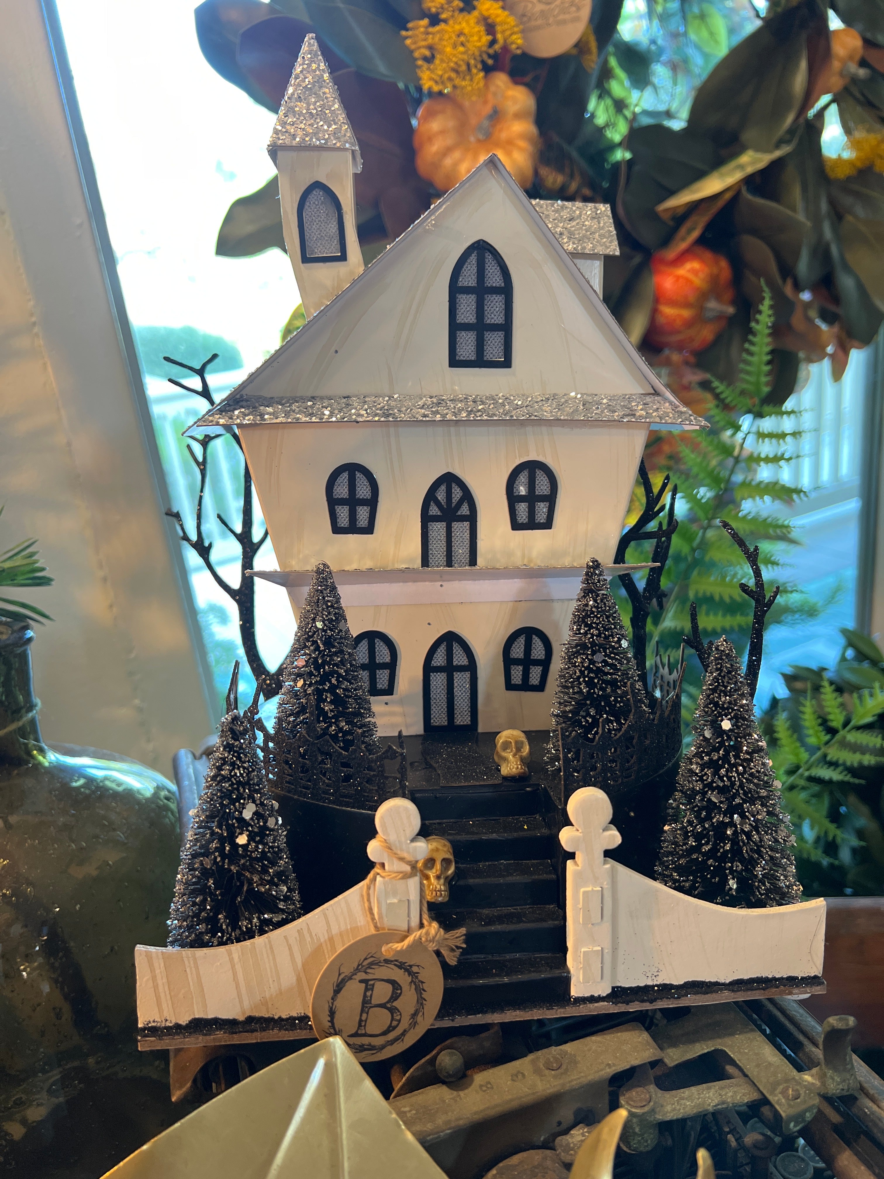 Haunted House Sparkle White and Gray Cardboard with Skulls LED with Timer