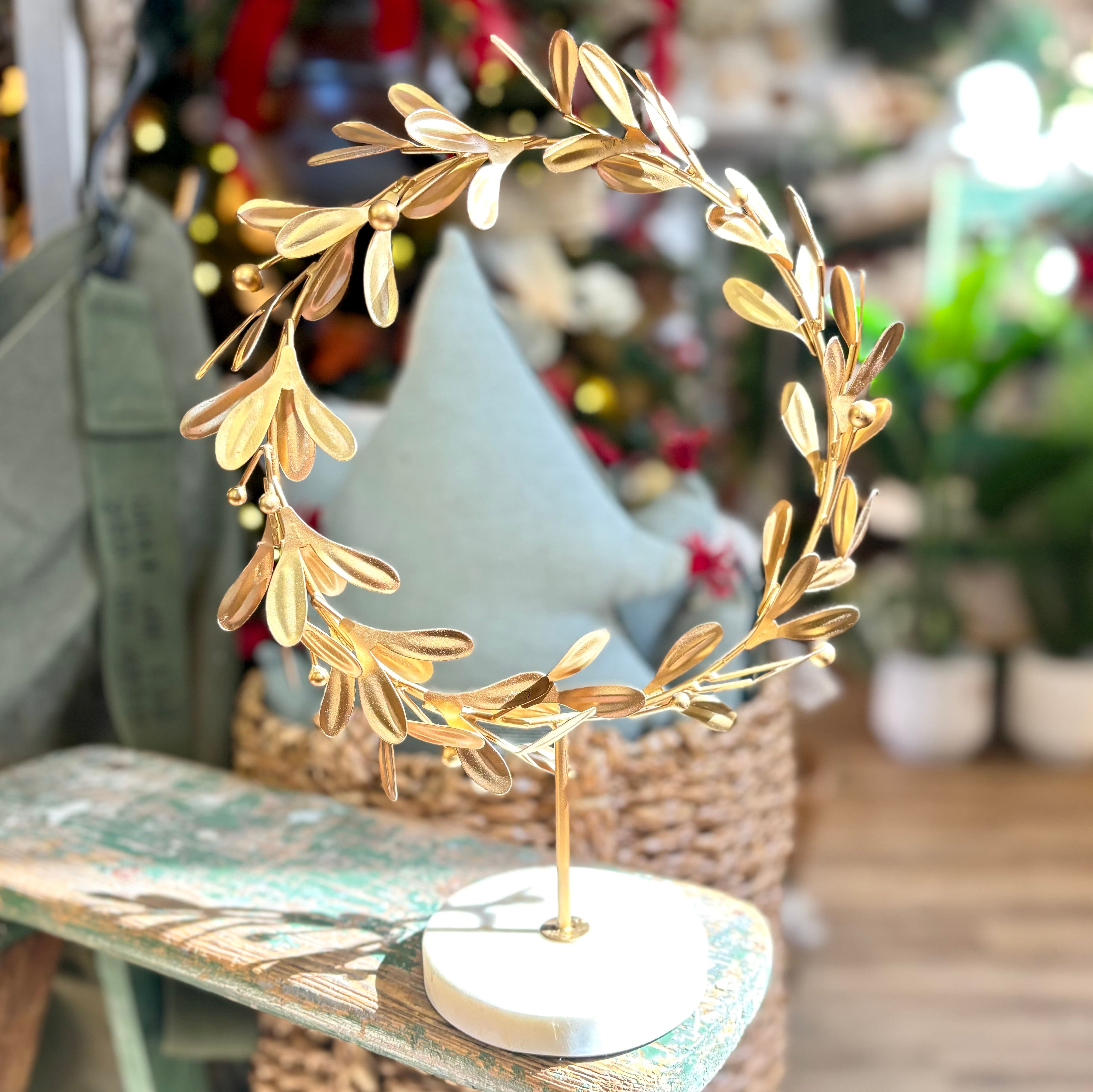 Metal Mistletoe Wreath Gold on Marble Stand