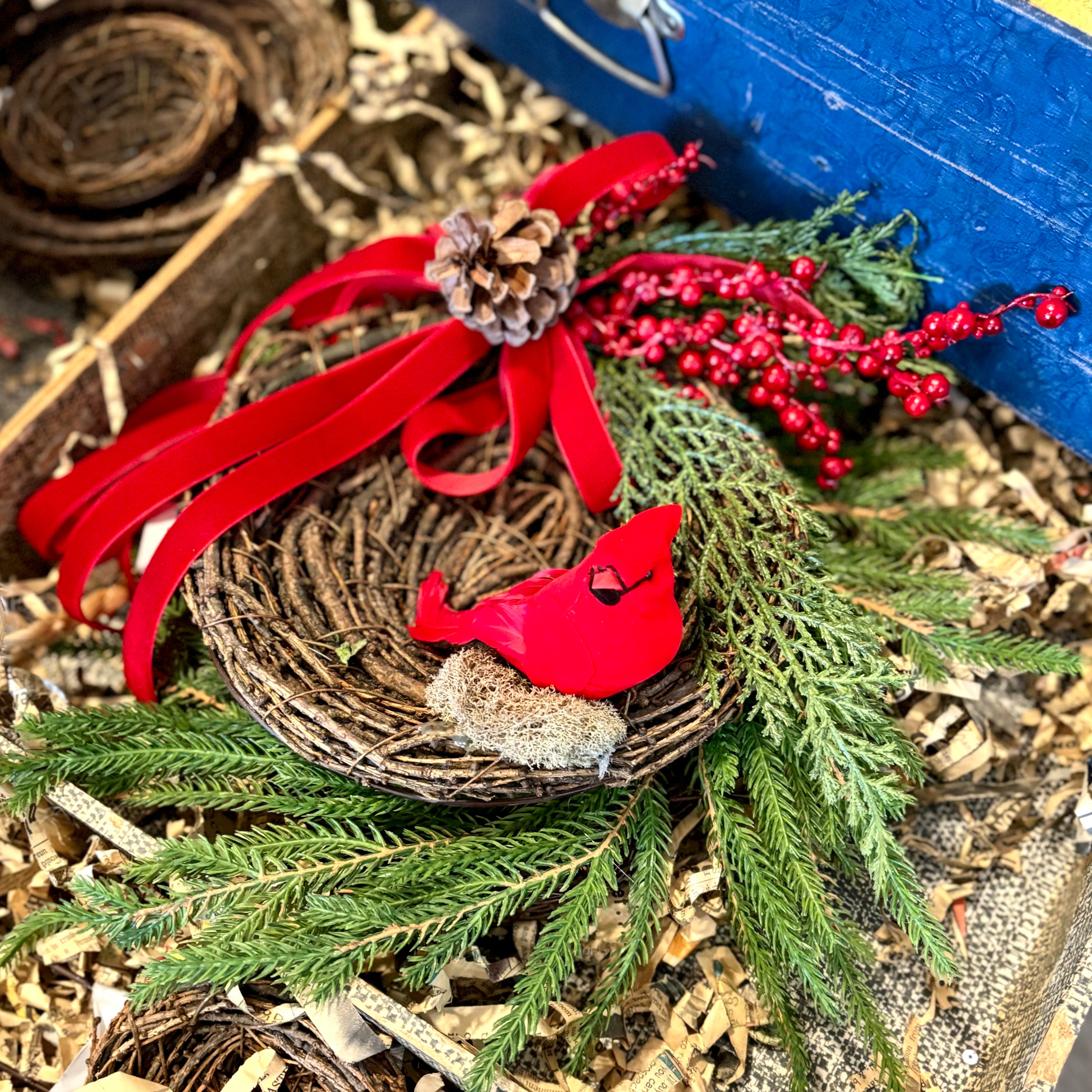 Red Cardinal in Holiday Nest