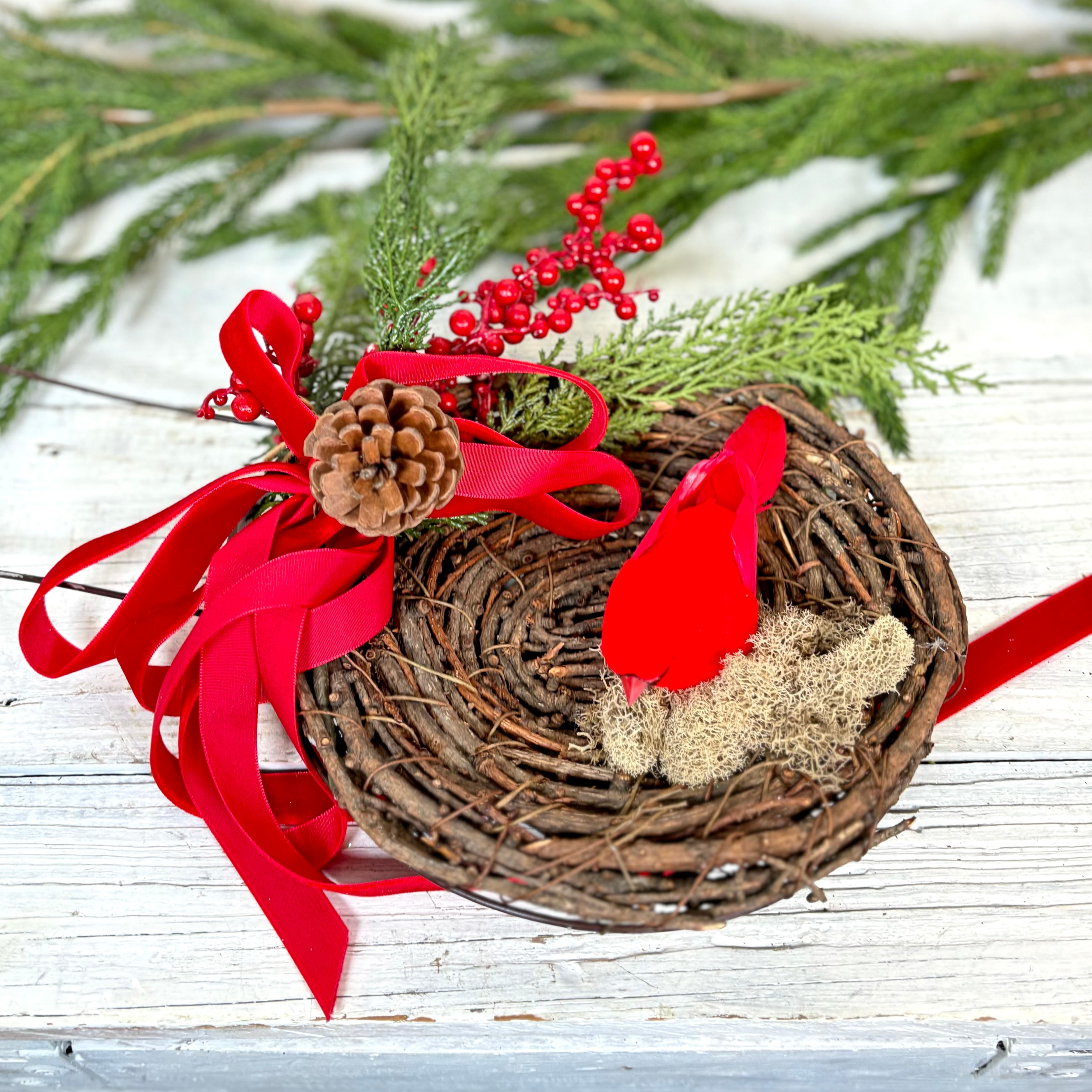 Red Cardinal in Holiday Nest