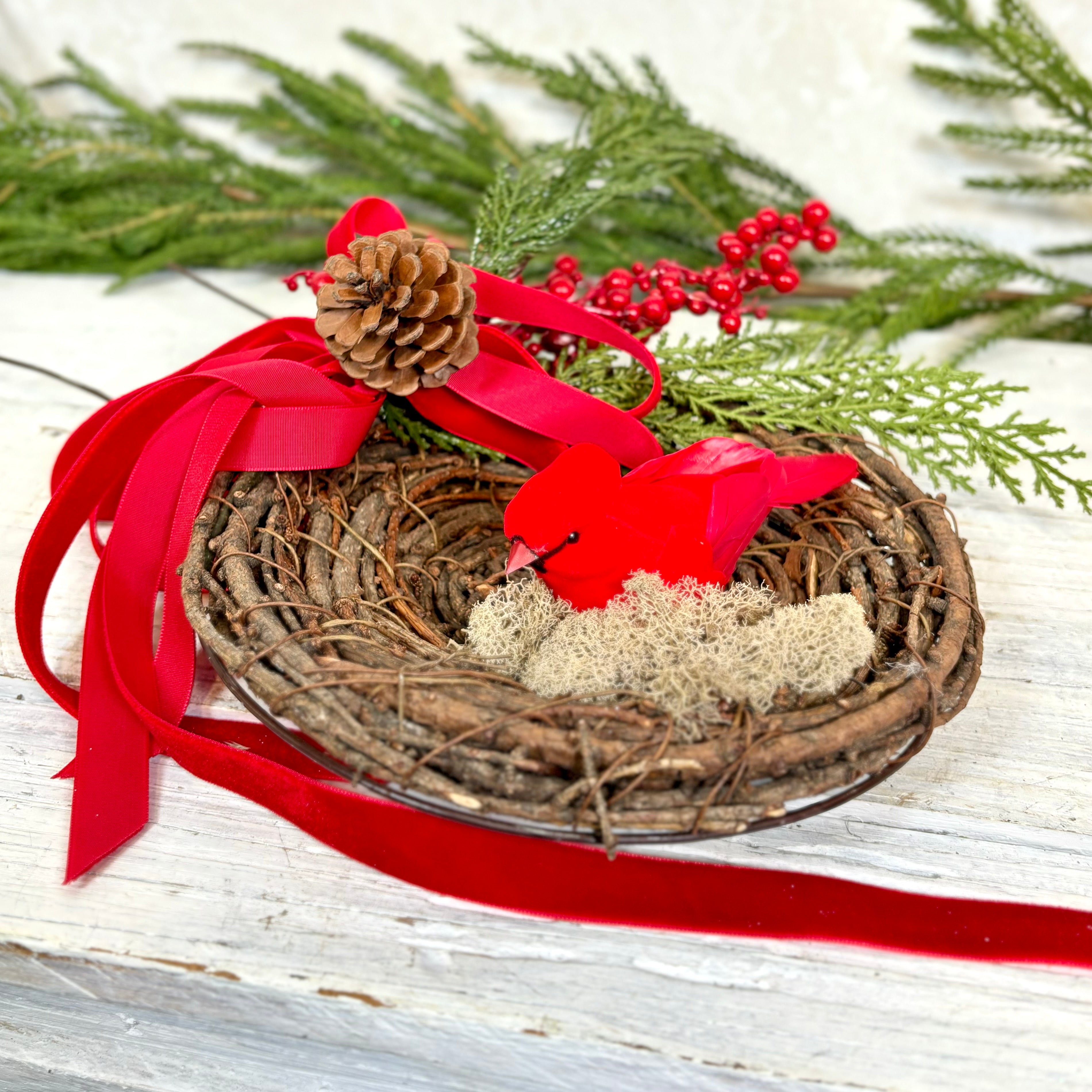 Red Cardinal in Holiday Nest