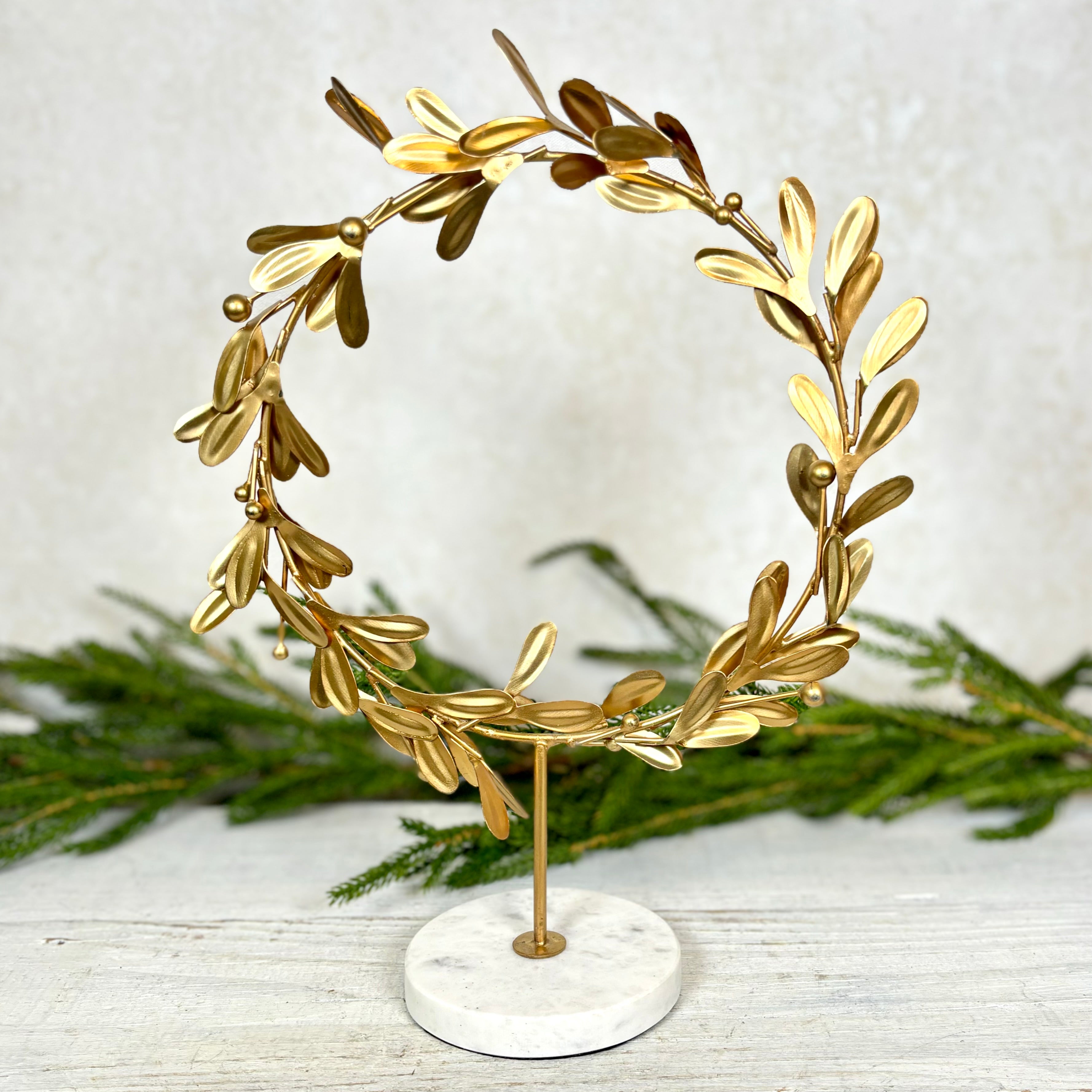 Metal Mistletoe Wreath Gold on Marble Stand