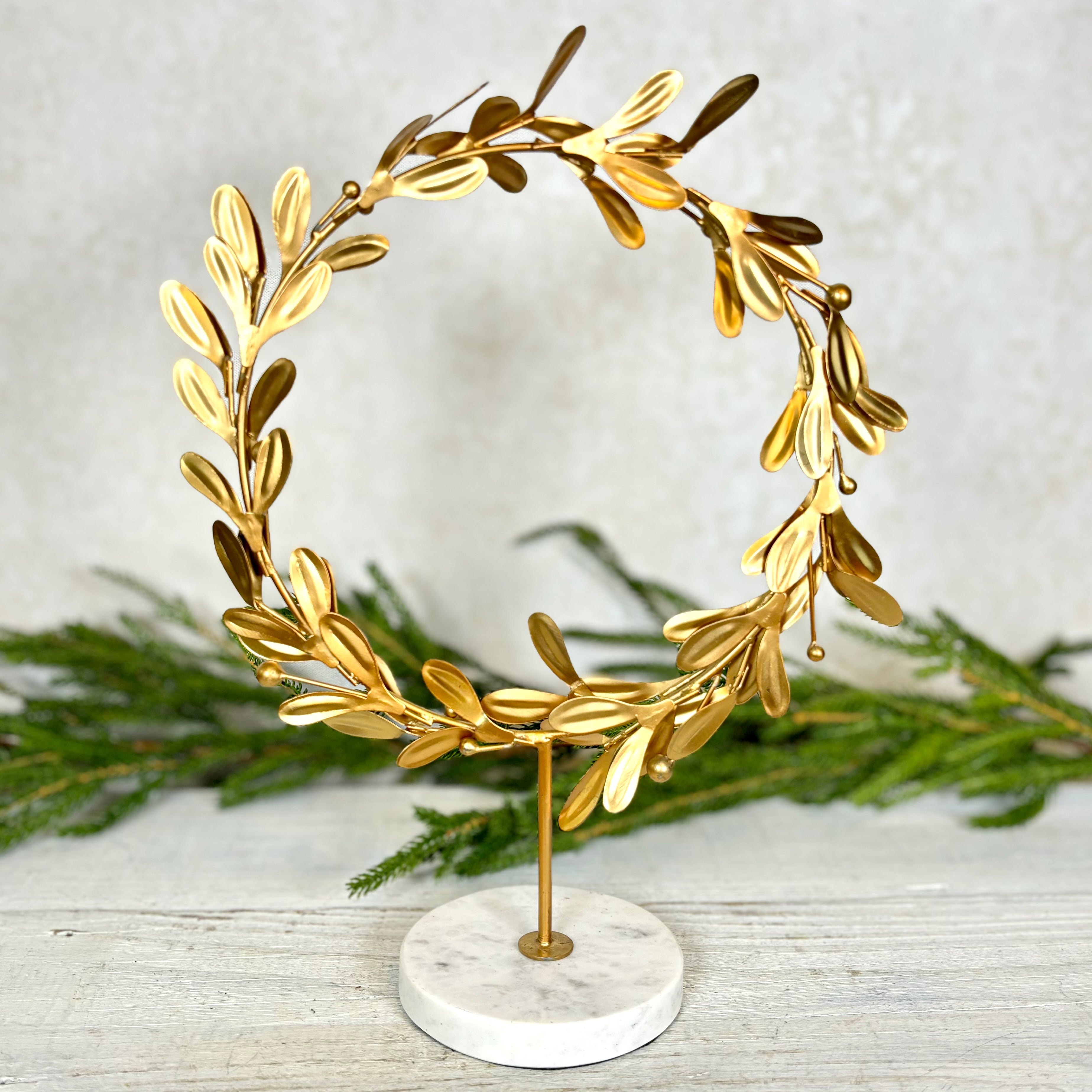 Metal Mistletoe Wreath Gold on Marble Stand