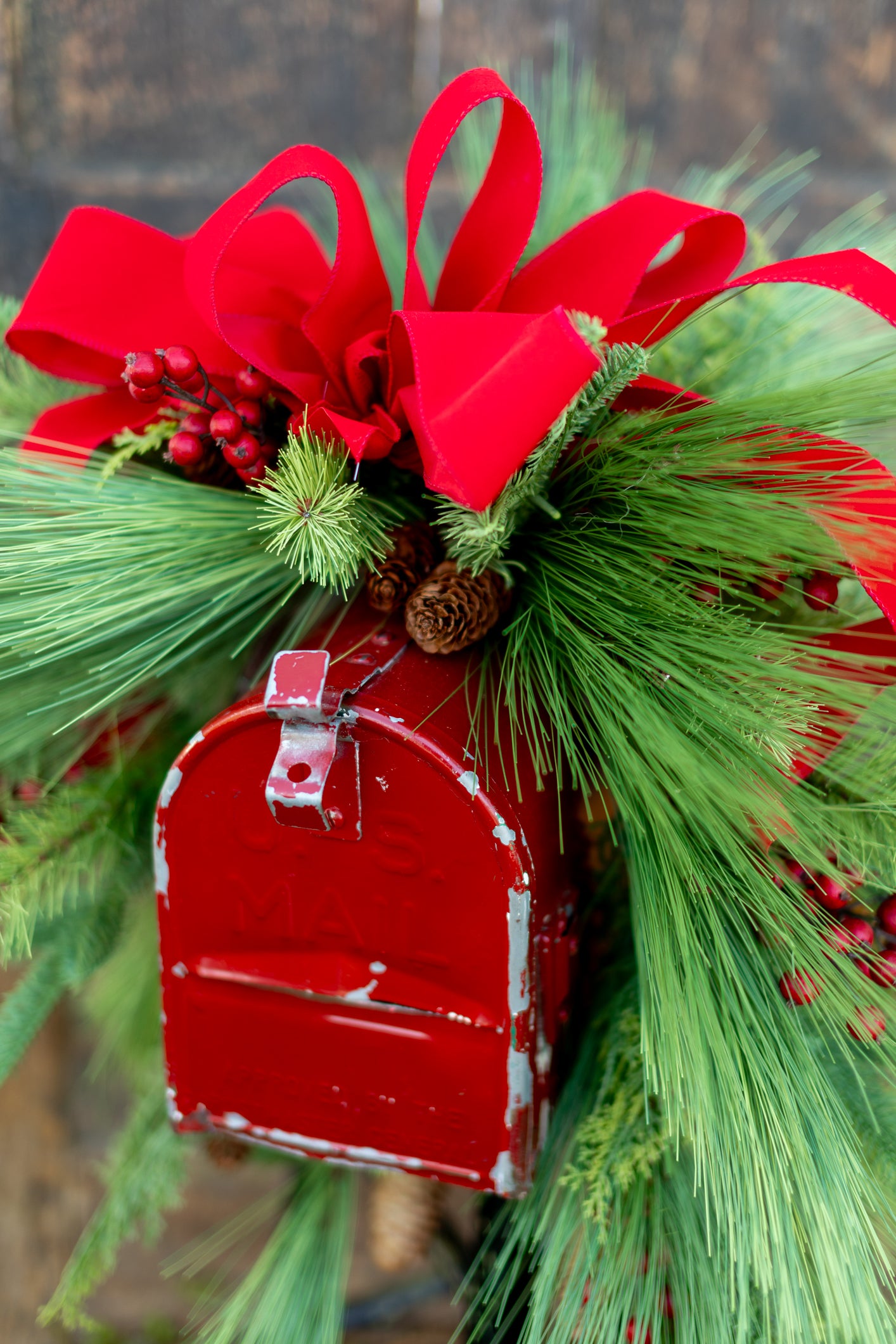 Decorated Outdoor Swag with Berries, Pine and Velvet Ribbon
