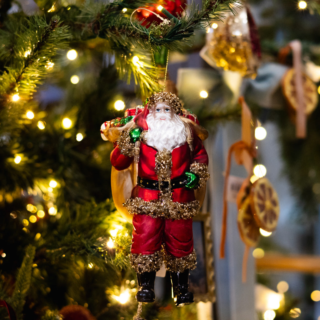 Santa's Delivery Glass Ornament