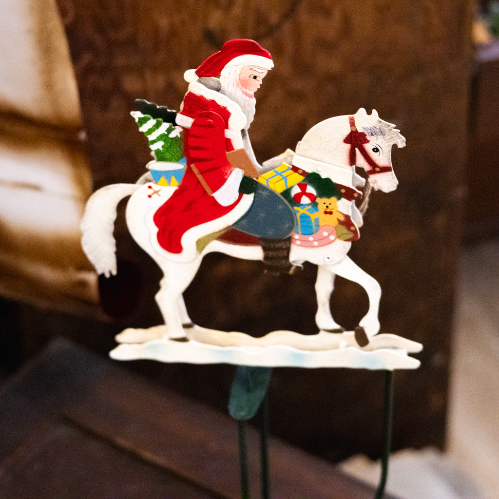 Santa Rocking on A Rocking Horse