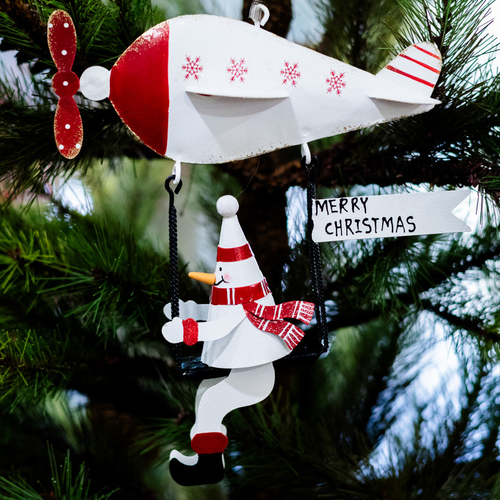 Metal Snowman on Flying Machine with Spring Hangers