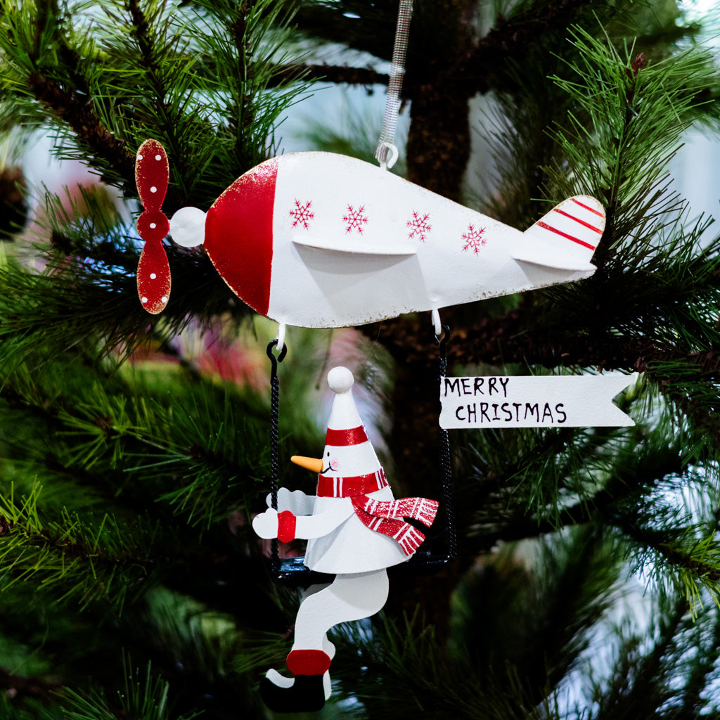 Metal Snowman on Flying Machine with Spring Hangers