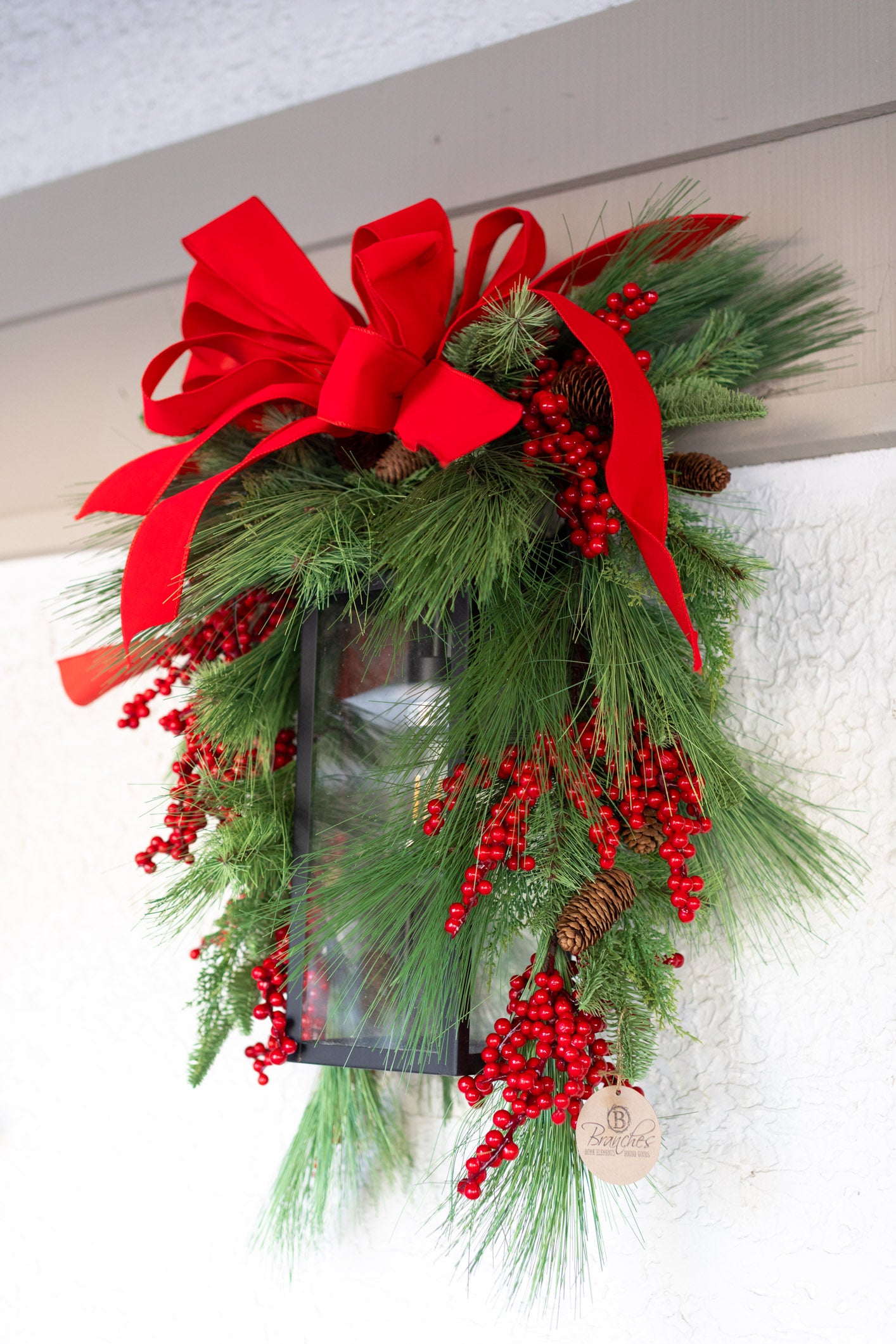 Decorated Outdoor Swag with Berries, Pine and Velvet Ribbon