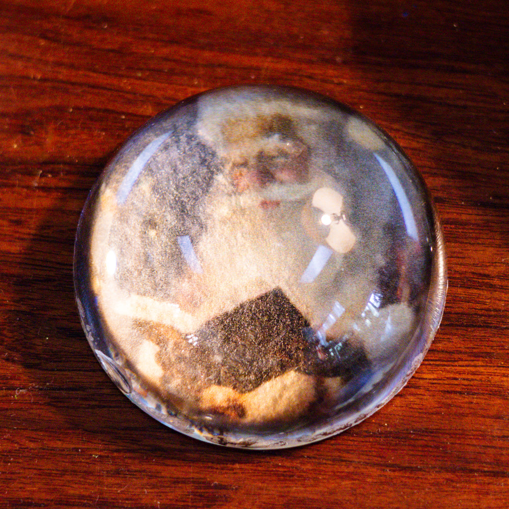 Santa Reading Book Glass Paperweight