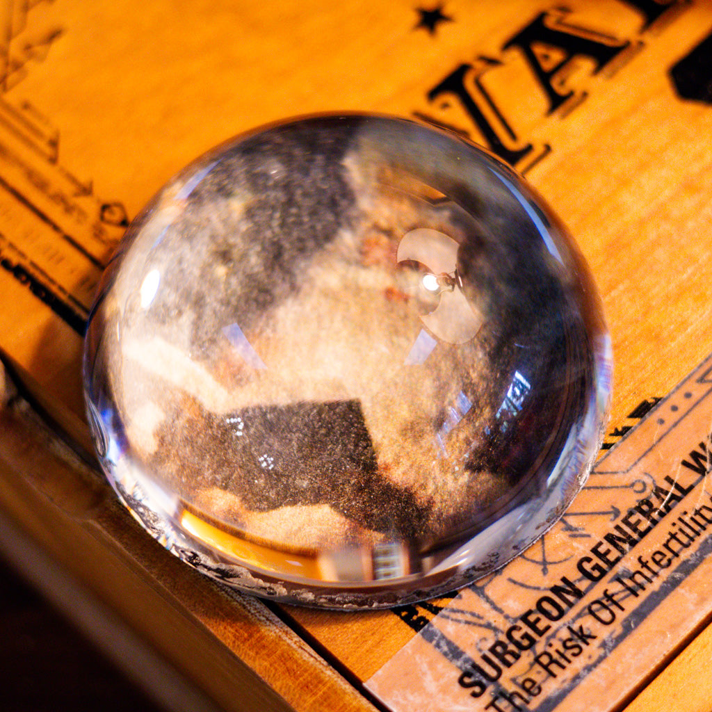 Santa Reading Book Glass Paperweight