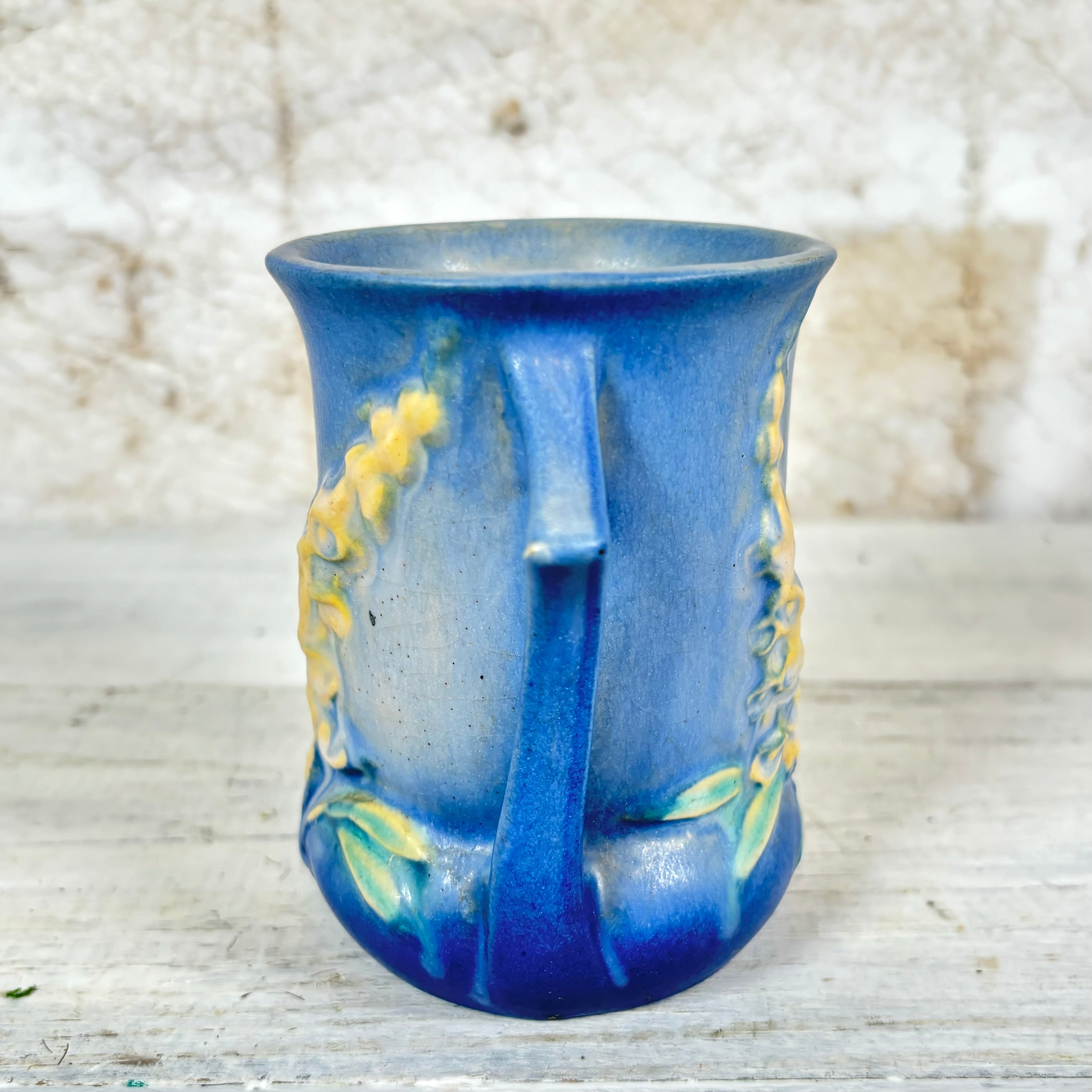 Roseville Blue Pottery with Flowers