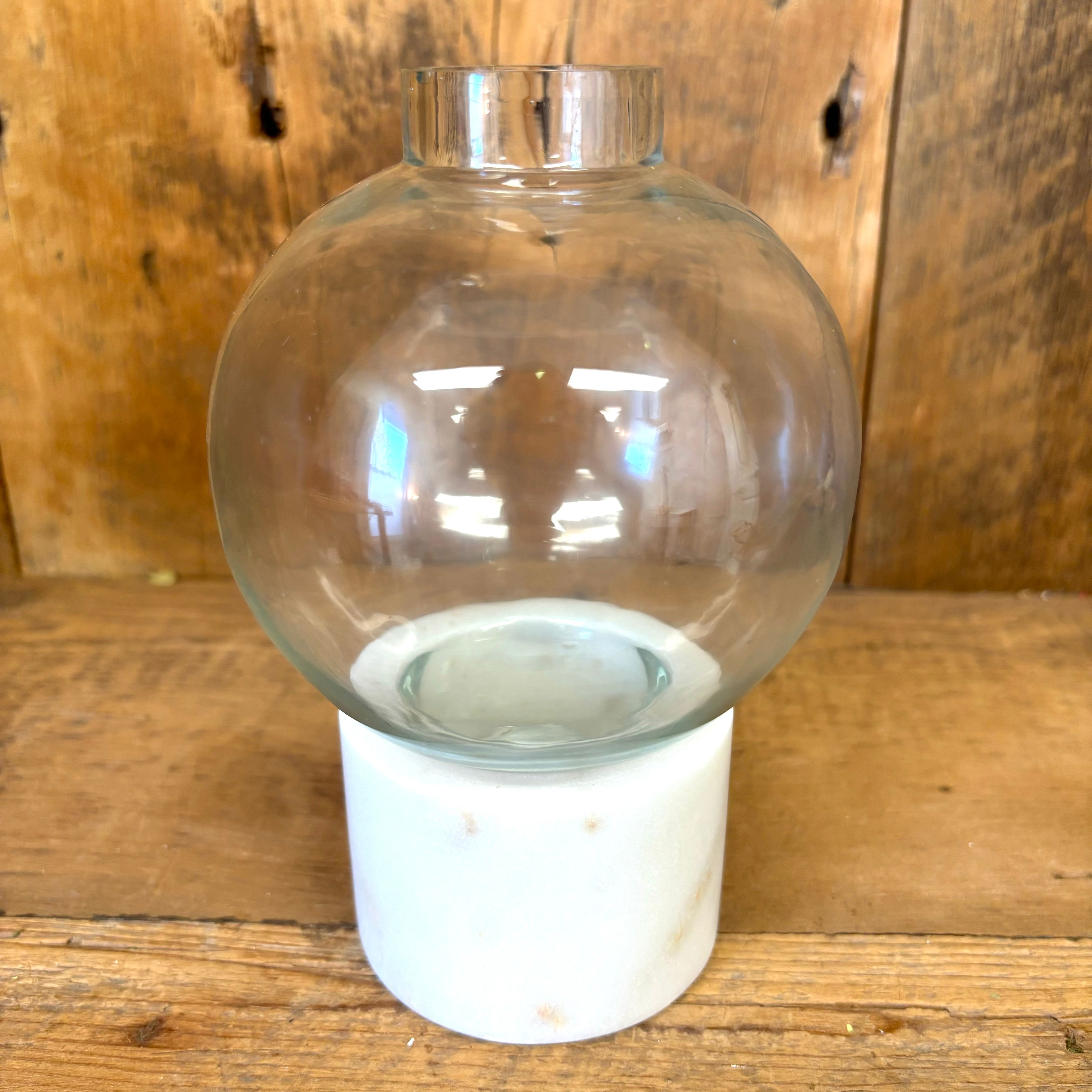 Clear Round Glass Vase on White Marble Base