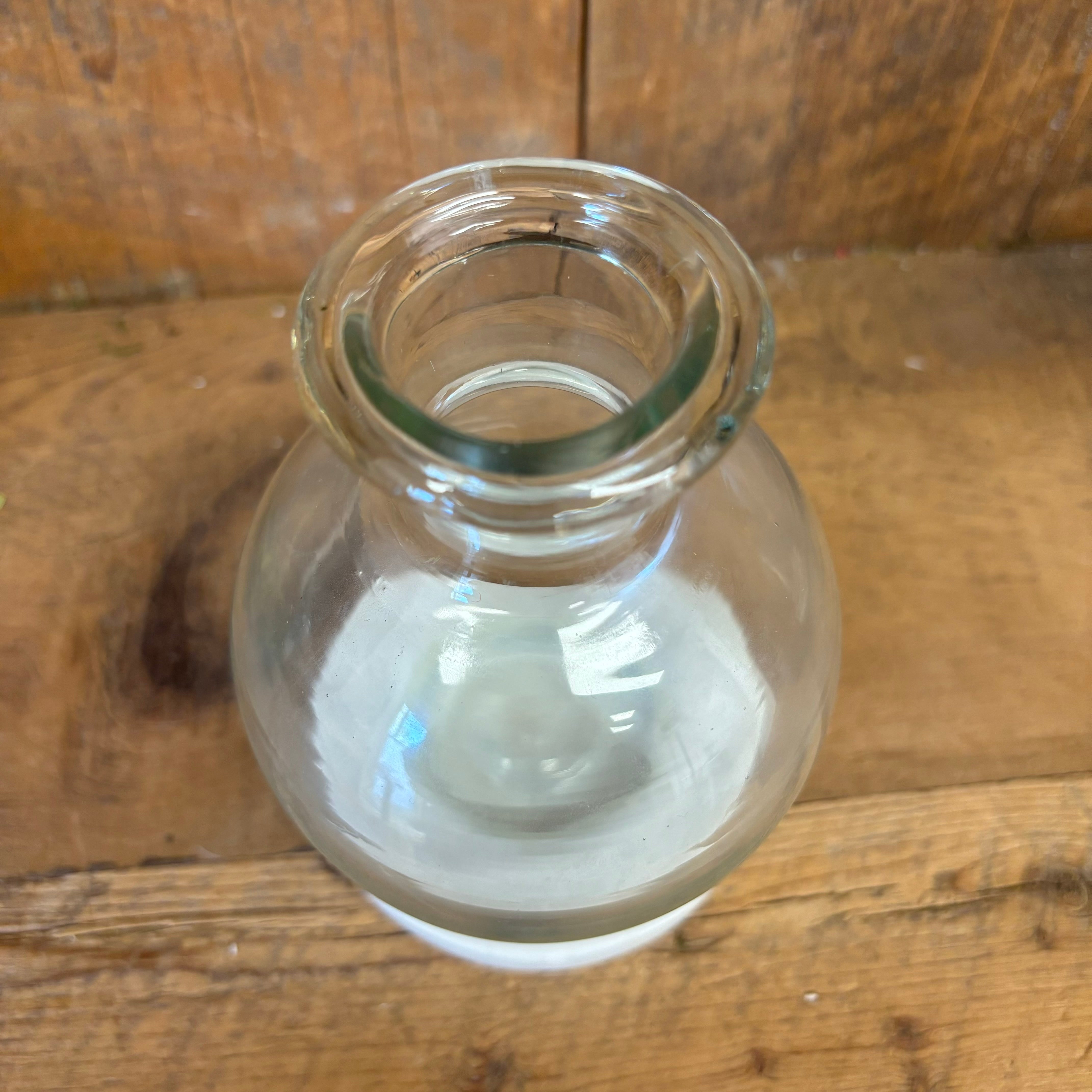 Clear Glass Round Vase on White Marble Base