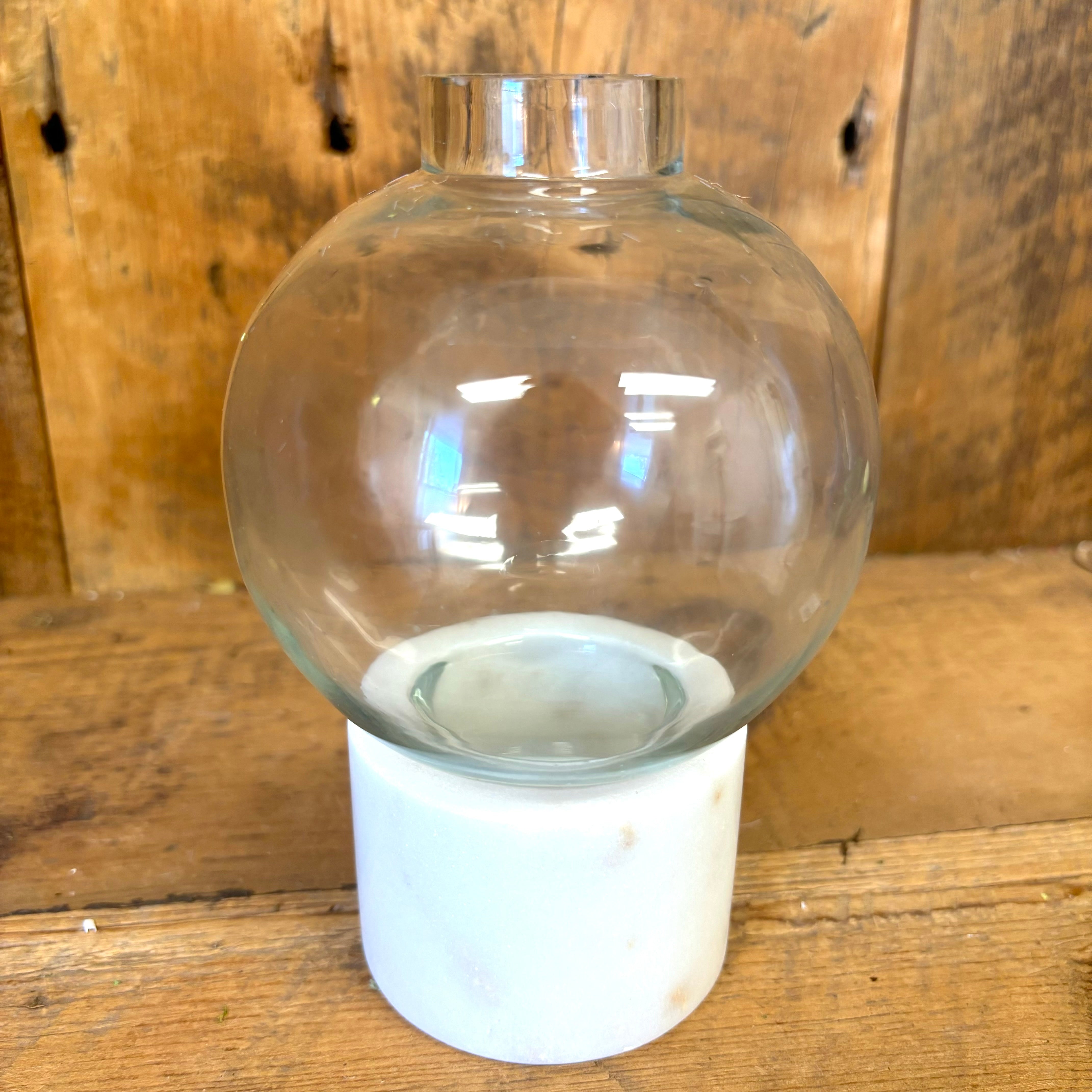 Clear Round Glass Vase on White Marble Base