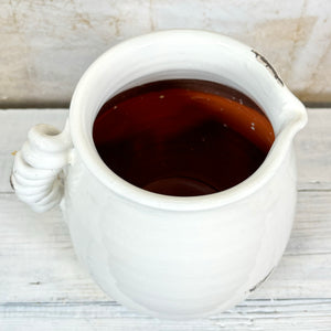 White Ceramic Pitcher with Twisted Handle